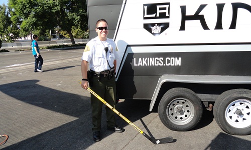 Sheriff Security Officer by L.A. Kings' truck