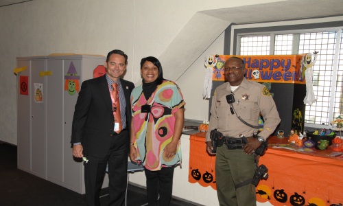 Picture of LAC+USC CEO Dan Castillo with Sheriff Personnel.