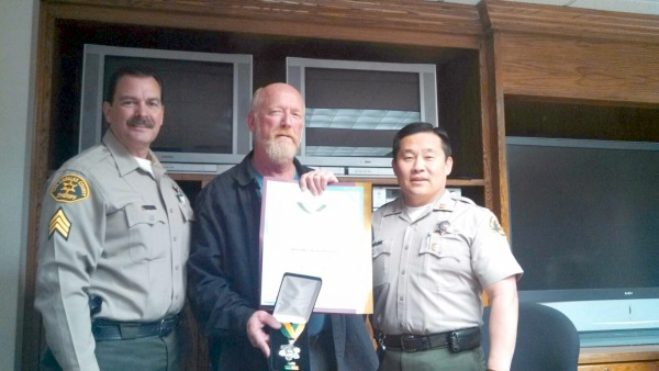 Sgt. Brink, Retired Member Jerry Hill, and Capt. Bill Song