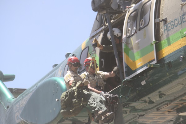 Members of the Montrose Search & Rescue Team prepare to be lowered by LA Sheriff's Air Rescue 5 earlier this year. 