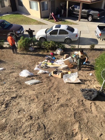 Deputies cleaning up a transient camp