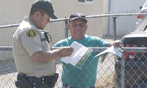 Deputies conduct survey of area residents (Photo T. Miller, Beacon Media)