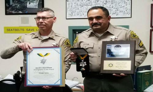 Deputy Cortez receiving awards